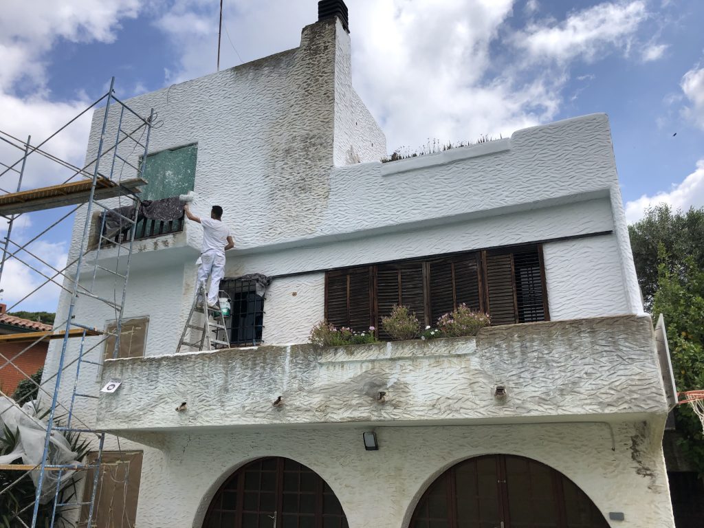Pintando fachada en La Garriga